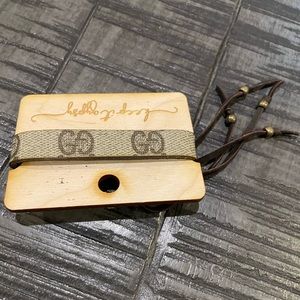 Seriously, cute upcycled Gucci leather bracelet.